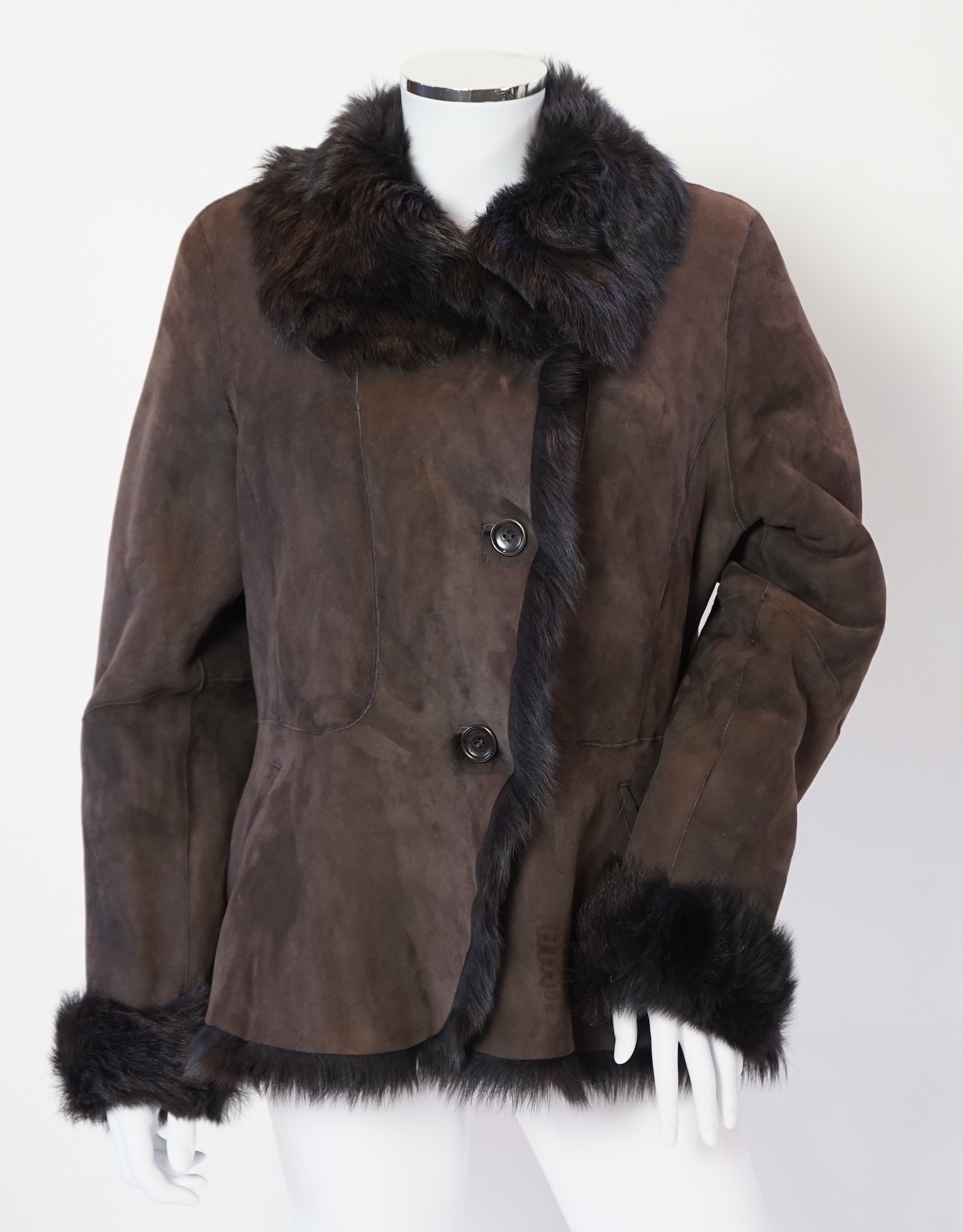 A lady's L K Bennett brown shearling jacket, size Large